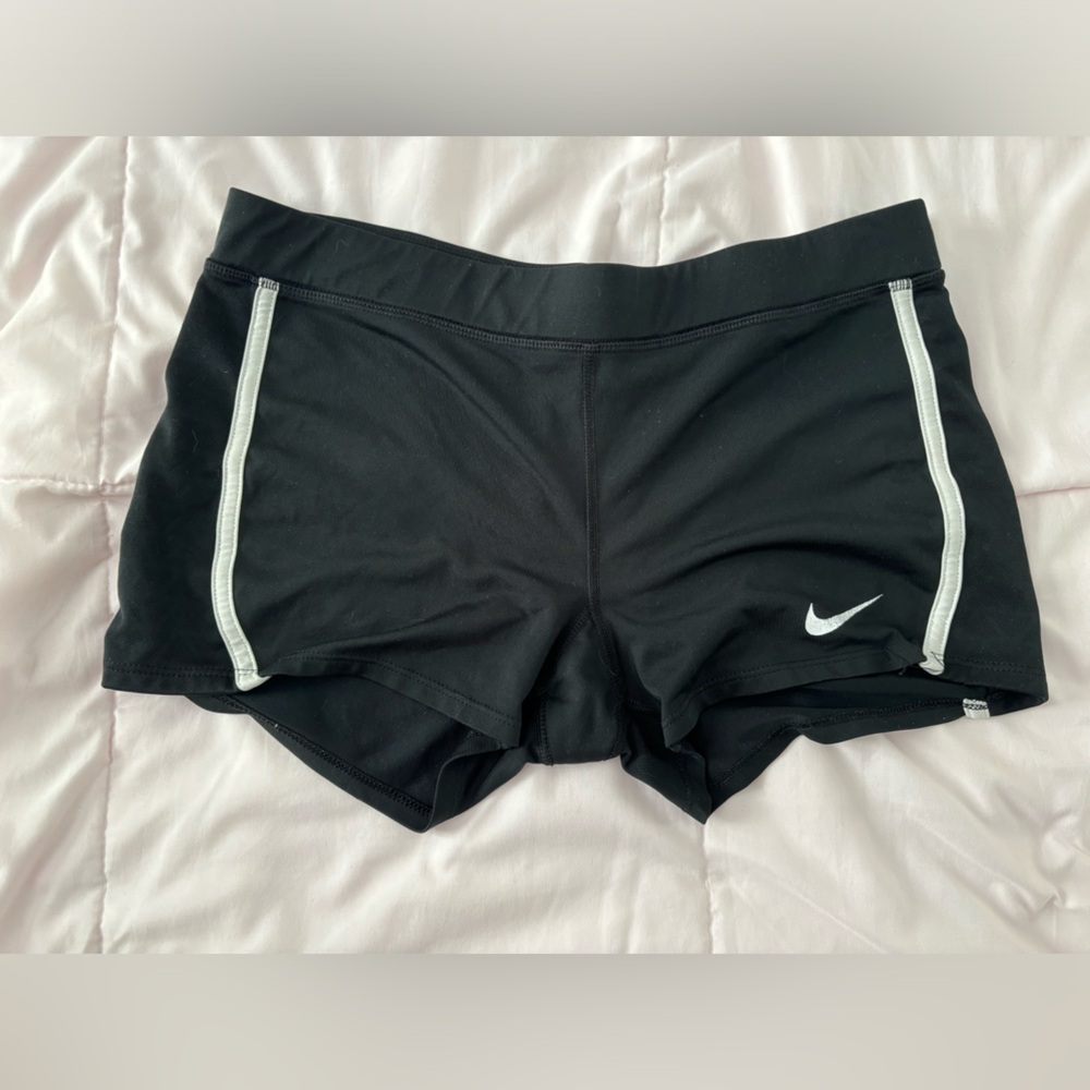 Nike track shorts.